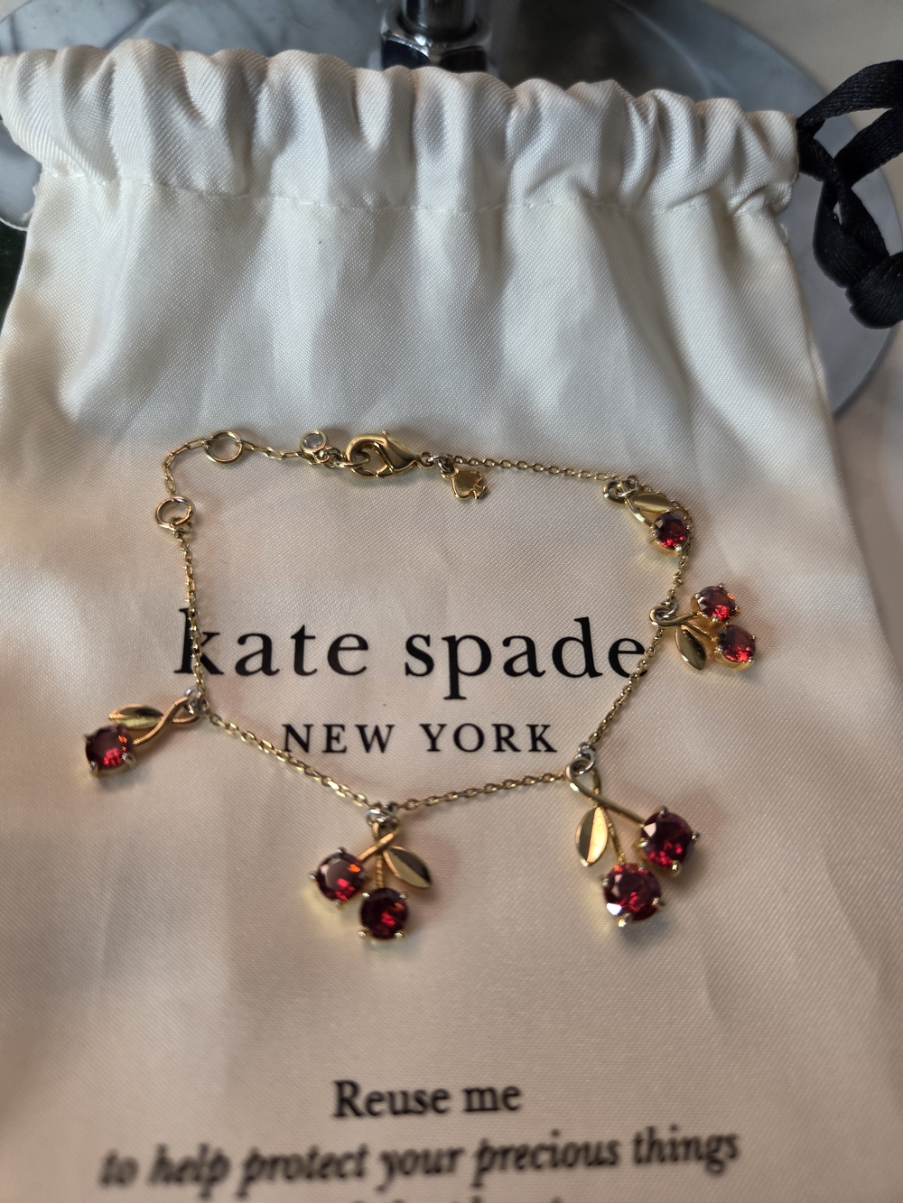 Kate Spade Gold Bracelet with Red Cherry Charms & Dustbag.
